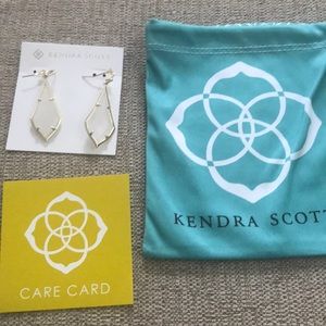 Kendra Scott gold drop earrings in white pearl